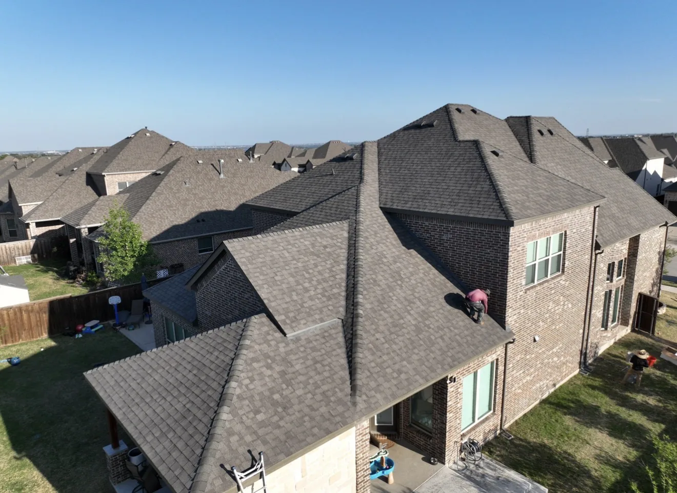 Roof replacement: Tan brick, squared and clean