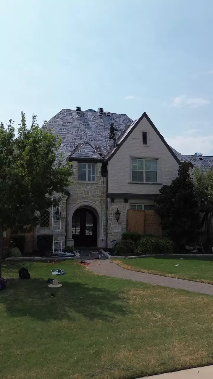 Drone footage still: Exterior Home Repairs After Storm Damage