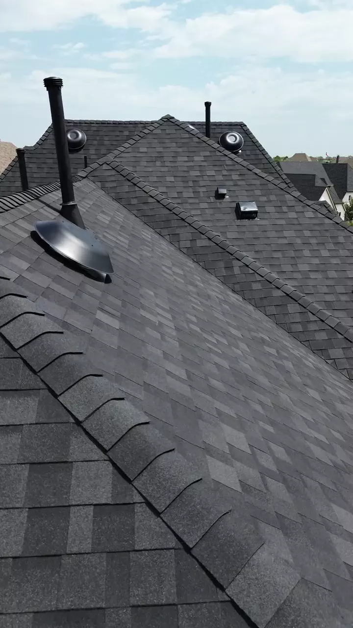 Drone footage still: Shingle, Metal and Other Roofing Systems